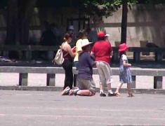 Pilgrims kneeling in Fatima square
